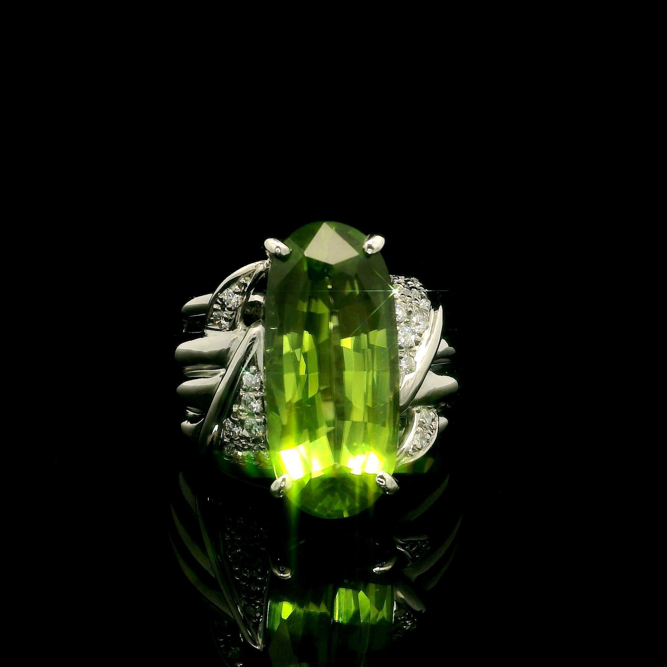 –Stone(s)–
(1) Natural Genuine Peridot - Large Elongated Oval Cut - Prong Set - Nice Green Color -17.8x8.2mm - 7.42ct (exact)
(20) Natural Genuine Diamond- Round Brilliant Cut - Pave Set - Nice Brilliant White Color - 0.19ctw (exact)
Total Carat