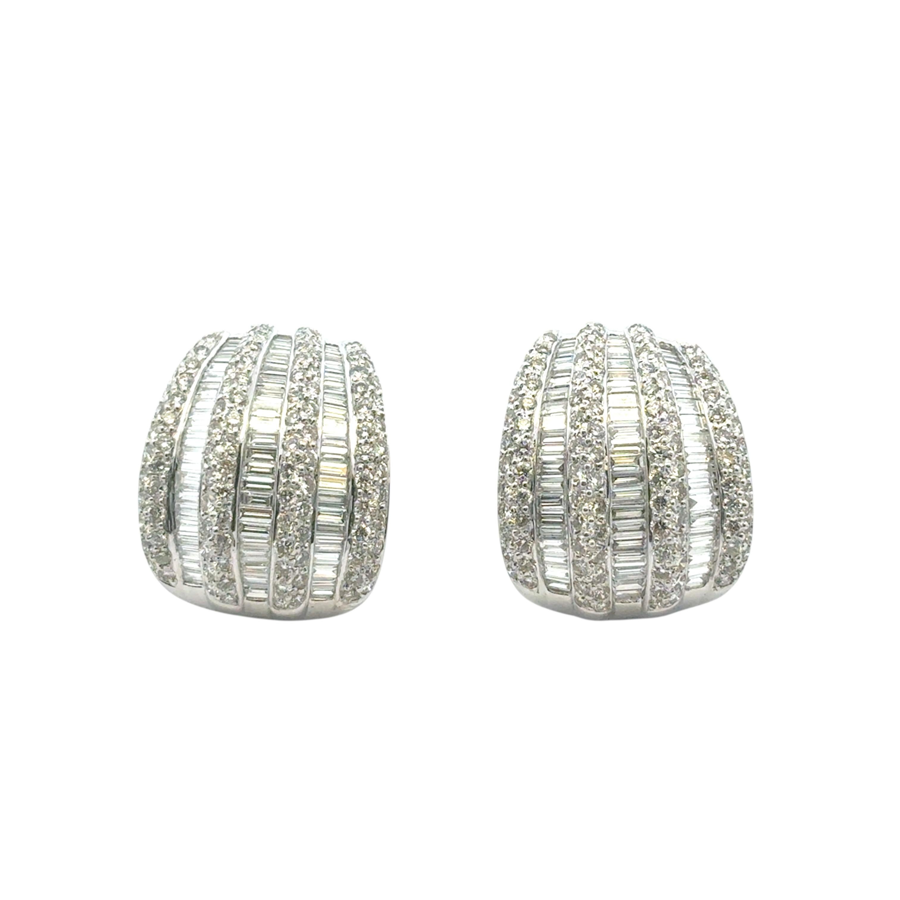 Platinum 7.90ctw Natural Baguette and Round Diamond Earrings

These stunning 7.90ctw Baguette Diamond Earrings is in excellent condition and is ready to ship!

Material: Platinum
Diamond Details: These earrings feature approximately 7.90 carats of