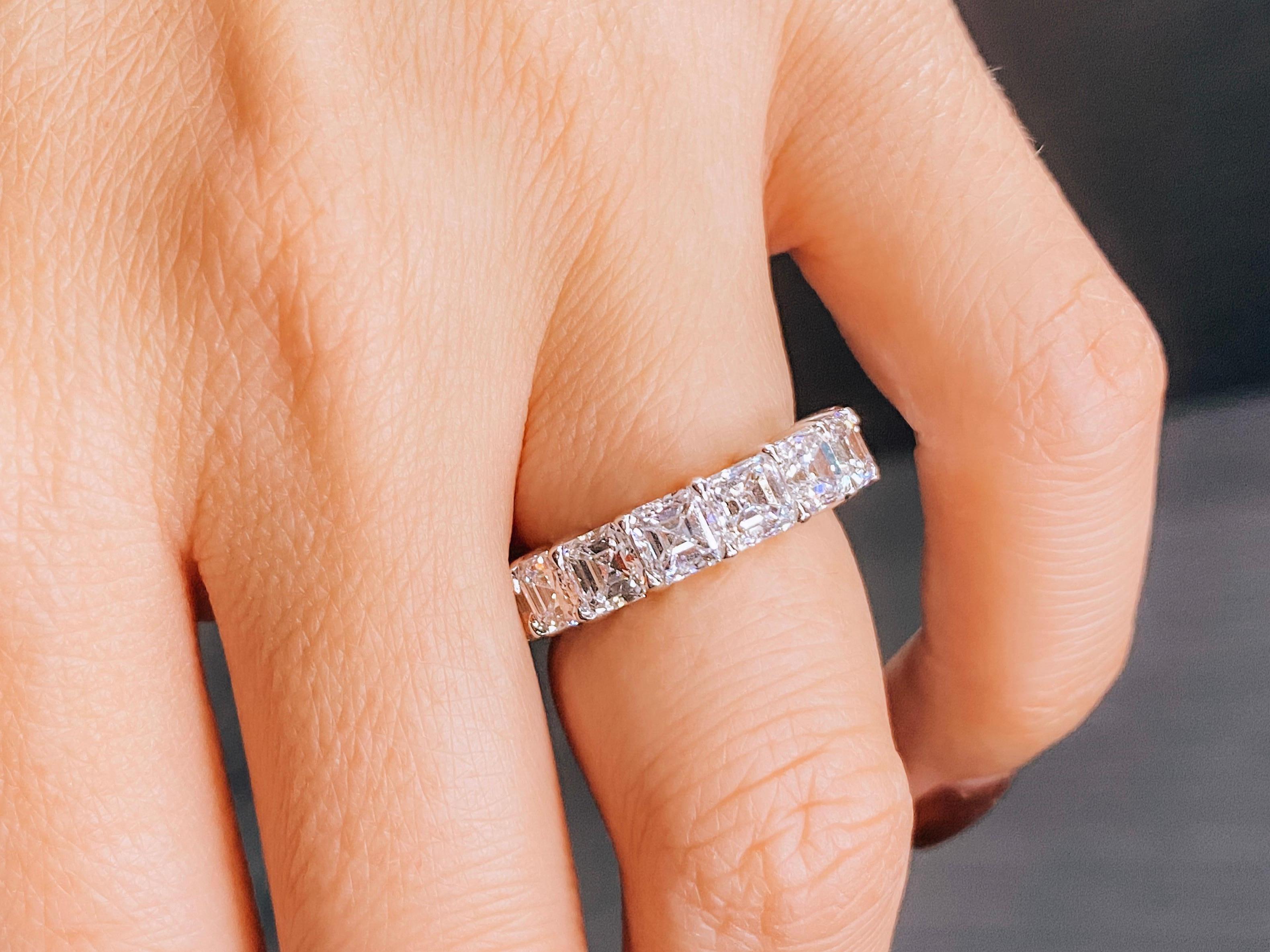 Platinum 7.95 Carat Asscher-Cut Diamond Eternity Band

This modern wedding band has eighteen (16) handset asscher cut diamonds running the entire length of the band. Each diamond weighs about half a carat for a total of 7.95 carats. This classic