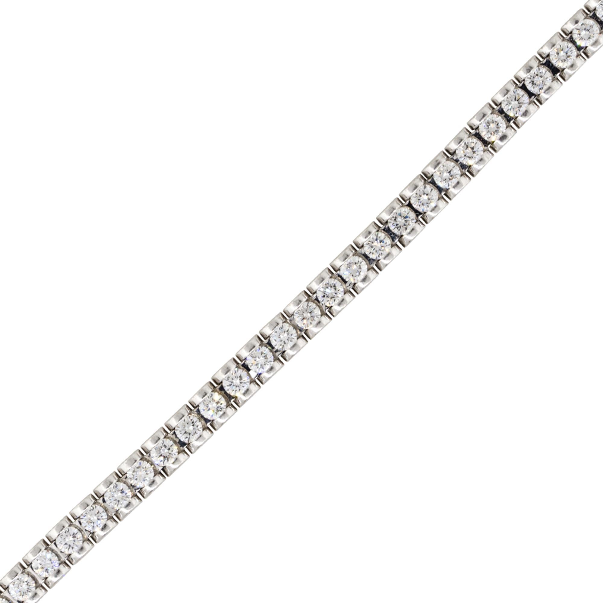 Material: Platinum White Gold
Diamond Details: Approx. 7ctw round brilliant diamonds. Diamonds are G/H in color and SI in clarity.
Clasps: Tongue in box clasp with safety latch
Total Weight: 43.8g (28.1dwt) 
Length: 7.25