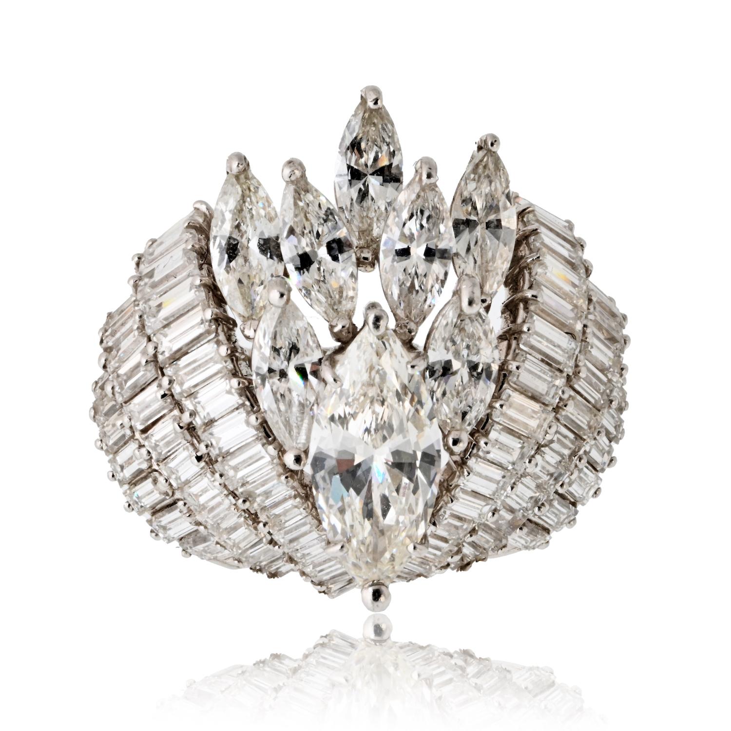 A stunning creation from the 1960s, this estate diamond ring is crafted in platinum and showcases timeless elegance with its vintage design. At the center sits a sparkling 1.50-carat marquise-cut diamond, graded G–H color and VS–SI clarity. Flanking