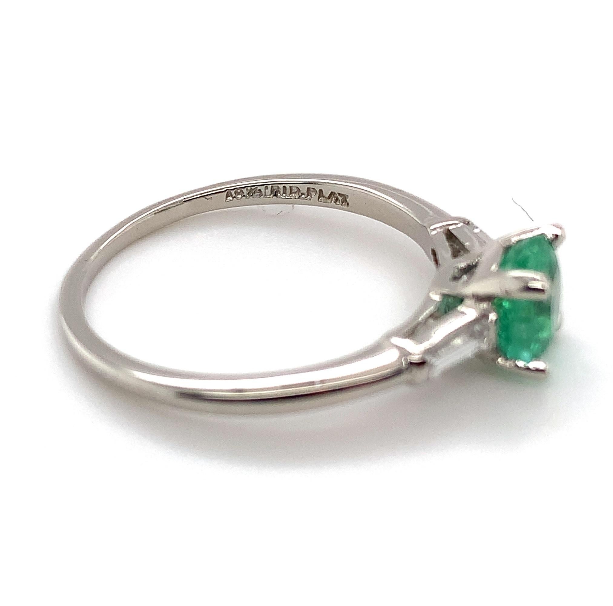 Round Cut Platinum .83ct Emerald and Diamond Baguette Ring