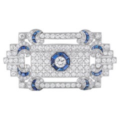 Broche de platino con diamantes y zafiros de 8,45 ct MF38-110625