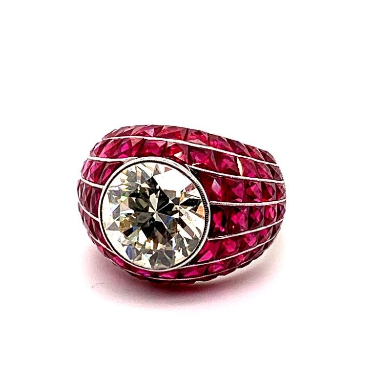 5.82 carat diamond center stone, with 8.67 carat rubies, bombay ring set in platinum.

Sophia D by Joseph Dardashti LTD has been known worldwide for 35 years and are inspired by classic Art Deco design that merges with modern manufacturing