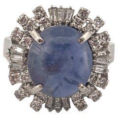 Platinum 9 Carat Blue Star Sapphire 0.79 Carat Round & Baguette Diamond Ring