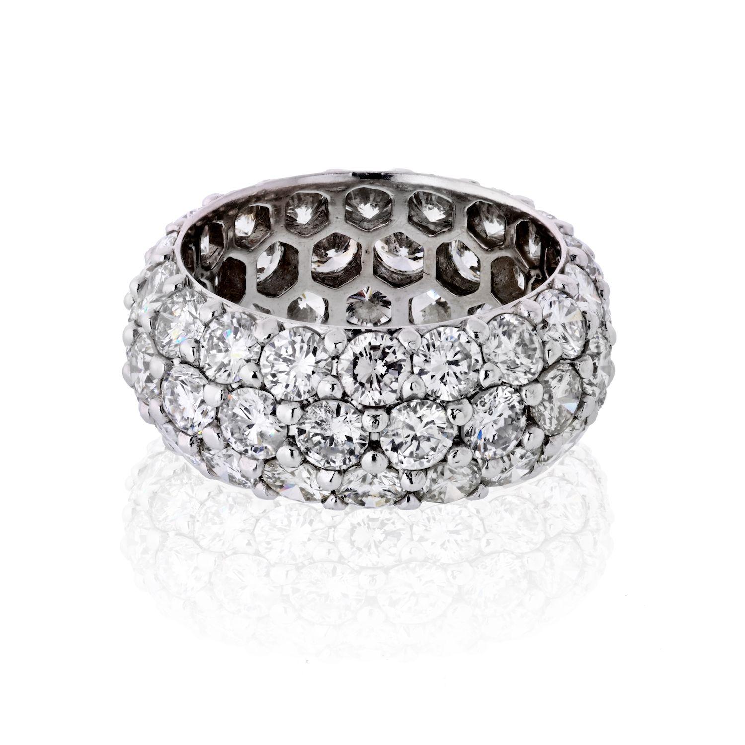 Mounted with 53 round brilliant cut diamonds this is one exciting eternity band! It is an impressive 0.3 inches wide and boasts 9 carat (approx.) in diamond weight. 
Crafted in platinum this ring has a slightly domed profile for comfort and smooth