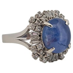 Platinum 9.00ctw Blue Star Sapphire 0.79ctw Round & Baguette Diamond Ring