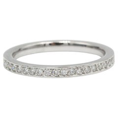 Media alianza de platino 950⁄‰ con 20 diamantes talla brillante
