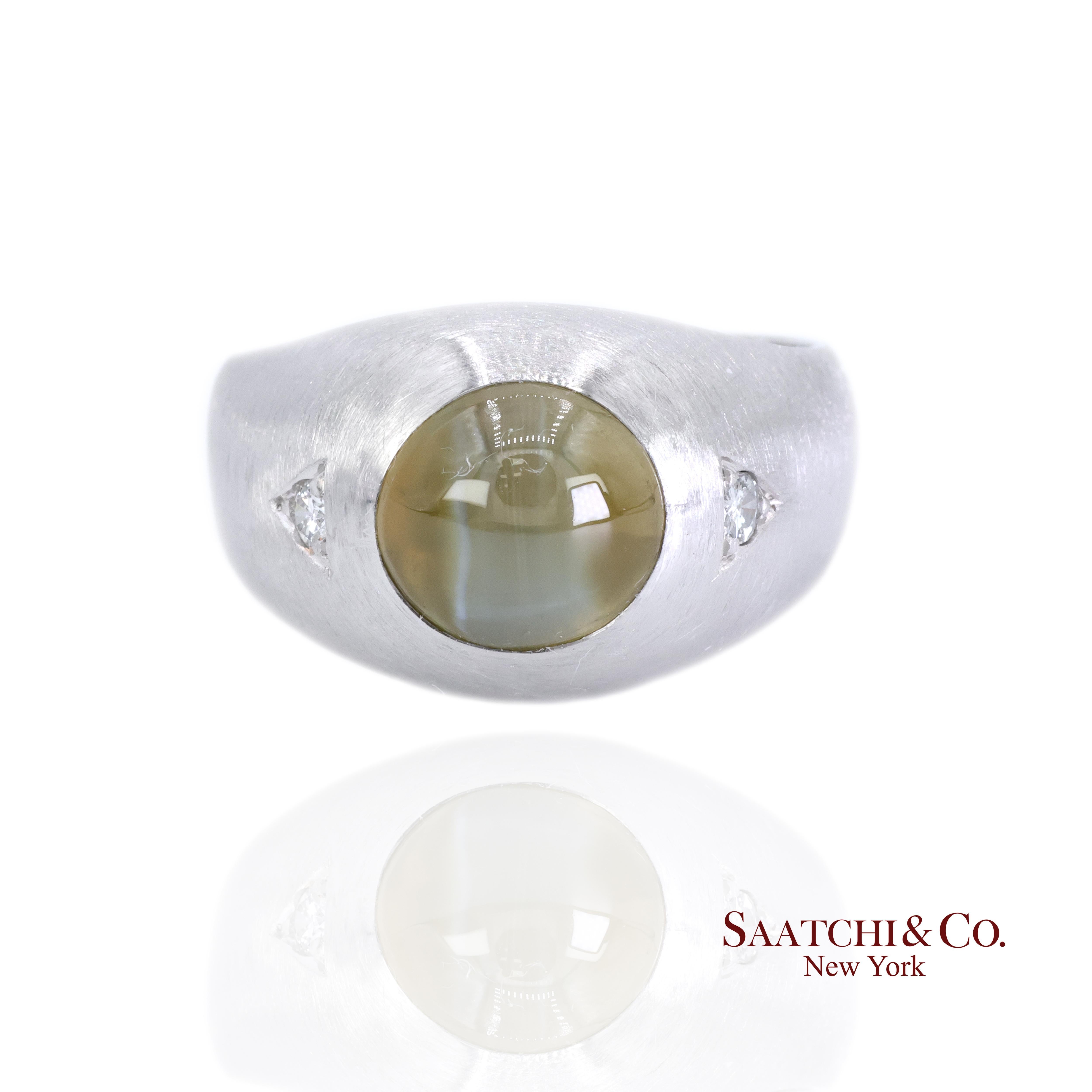 Ring mit Katzenauge und nat�ürlichem Diamant

Metall-Typ: Platin
Gesamtgewicht des Artikels: 22,2 Gramm
Ringgröße: 9.75 (veränderbar)
1:
Primärer Stein: Katzenauge
Primäres Karatgewicht: 5,0 Karat
Stein-Schliff: Cabochon
Steinfarbe:
