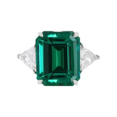 Antique Platinum 9.63 Carat Emerald 2 Stone Ring