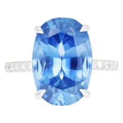 Platinum 9.72 Carat Cornflower Oval Cut No Heat Sapphire and Diamond Ring