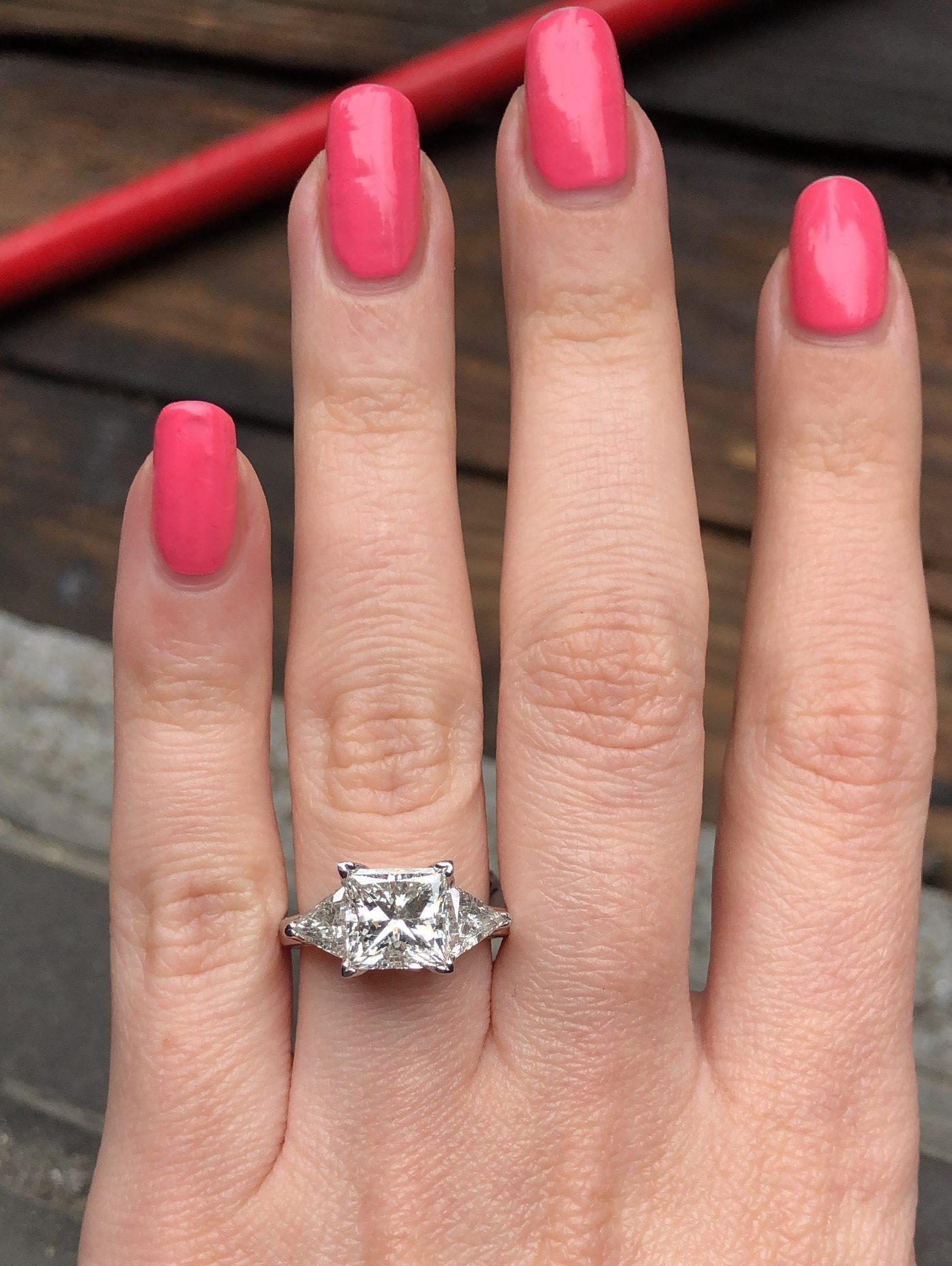 For Sale:  Platinum AGI Certified Three-Stone Engagement Ring Features 4.51ct TCW Diamonds 4