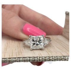 Platinum AGI Certified Three-Stone Engagement Ring Features 4.51ct TCW Diamonds 
