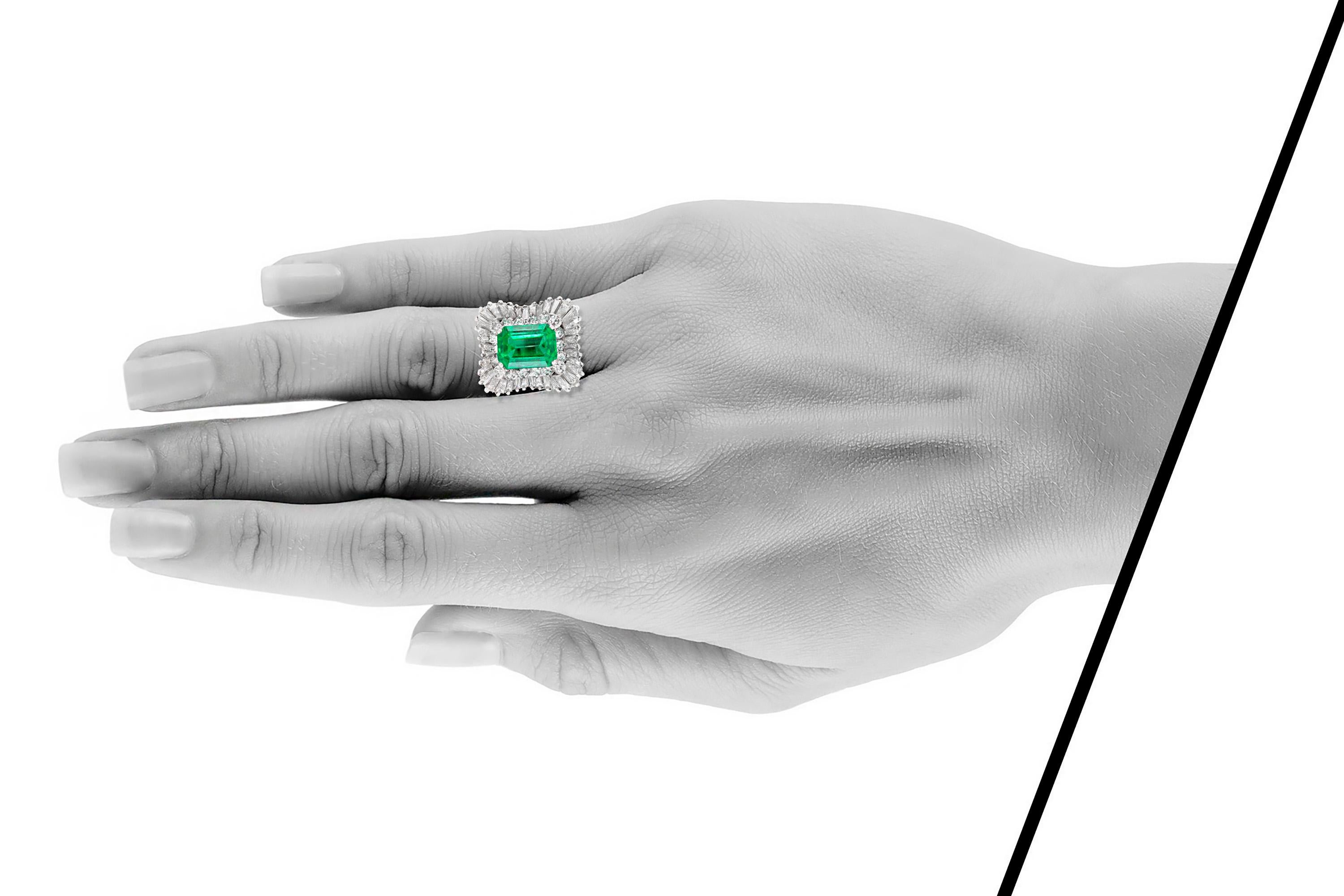 The ring is finely crafted in platinum with center AGL Colombian emerald weighing approximately total of 7.00 carat  and diamonds weighing approximately total of 4.00 carat.
NO# 1102752
Circa 1970.
