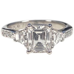 Platinum and 1 Carat Emerald Cut Diamond Engagement Ring