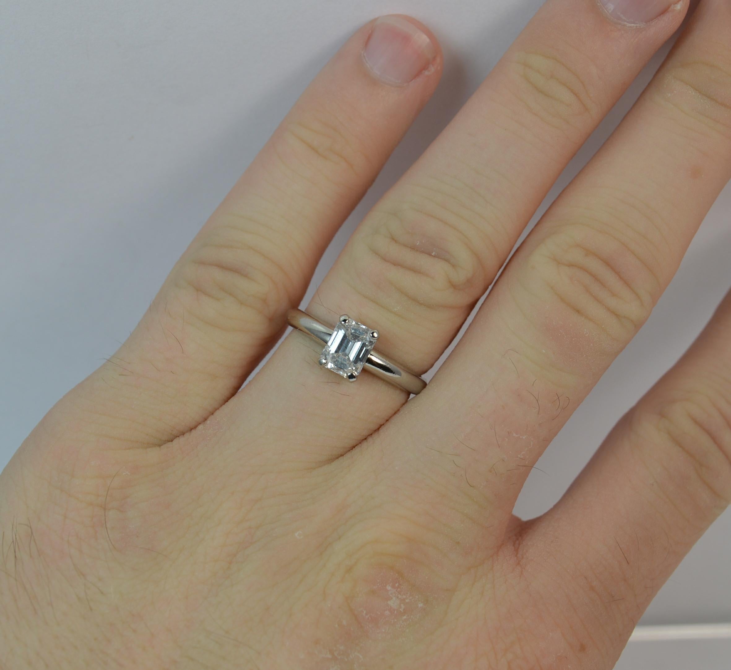 
A natural diamond and platinum ring.

Designed with a single emerald cut diamond in four claw setting.

The natural diamond has been weighed prior to setting as 1.01 carats.

5.05mm x 6.45mm approx stone. Bright and sparkly, eye clean.


Condition;