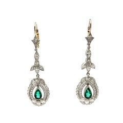 Platinum and 14 Karat Gold Vintage Old European Cut Emerald and Diamond Earrings