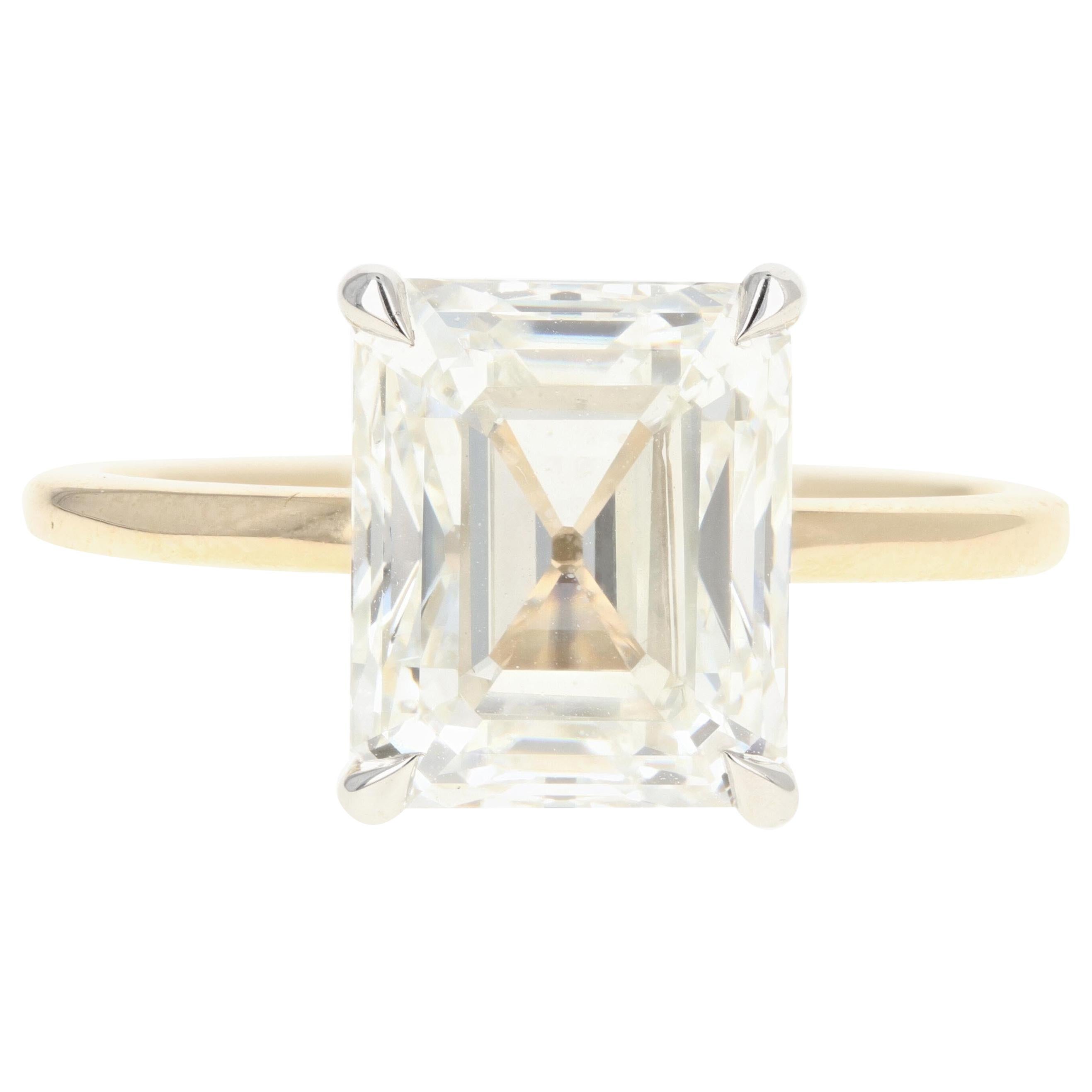 Platinum and 14 Karat Yellow Gold 4.30 Emerald Cut Diamond Engagement Ring