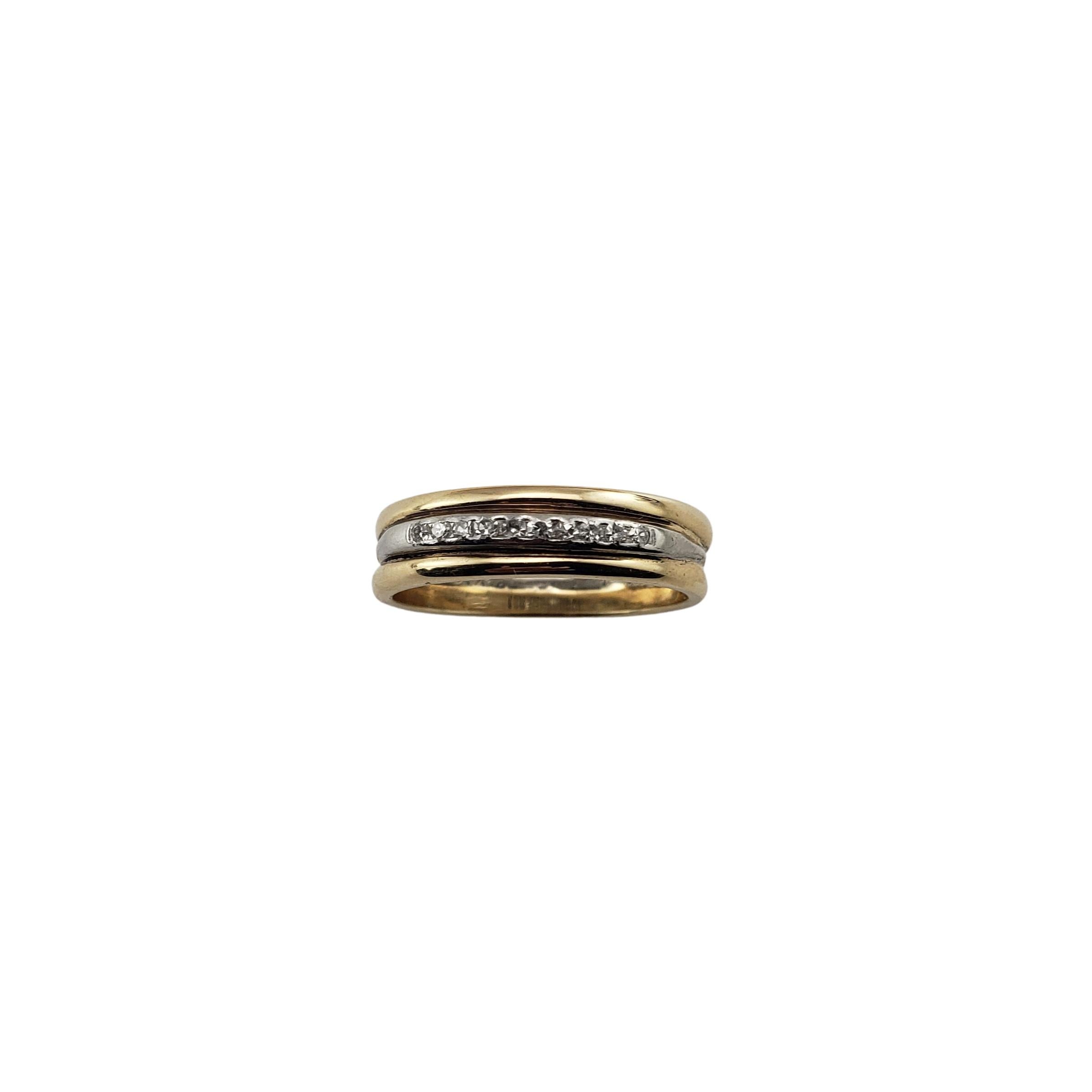 14 Karat Yellow Gold and Platinum and Diamond Band Ring Size 7.5-

This lovely band features ten round single cut diamonds set in beautifully detailed 14K yellow gold and platinum.  Width:  5 mm.
Center band is circa early 1900's; two yellow bands