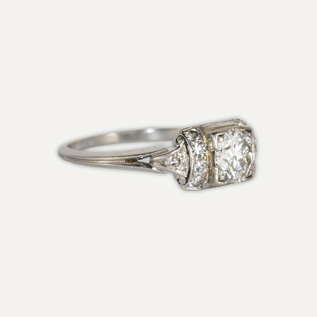 Ladies' vintage platinum and 14k white gold engagement ring set.
The main ring is stamped 900 Plat, 100 Irid.
The band is stamped 14k.
Their combined gross weight is 6.9 grams.
The center diamond is a round brilliant cut, .60 carats, H- I color, Si