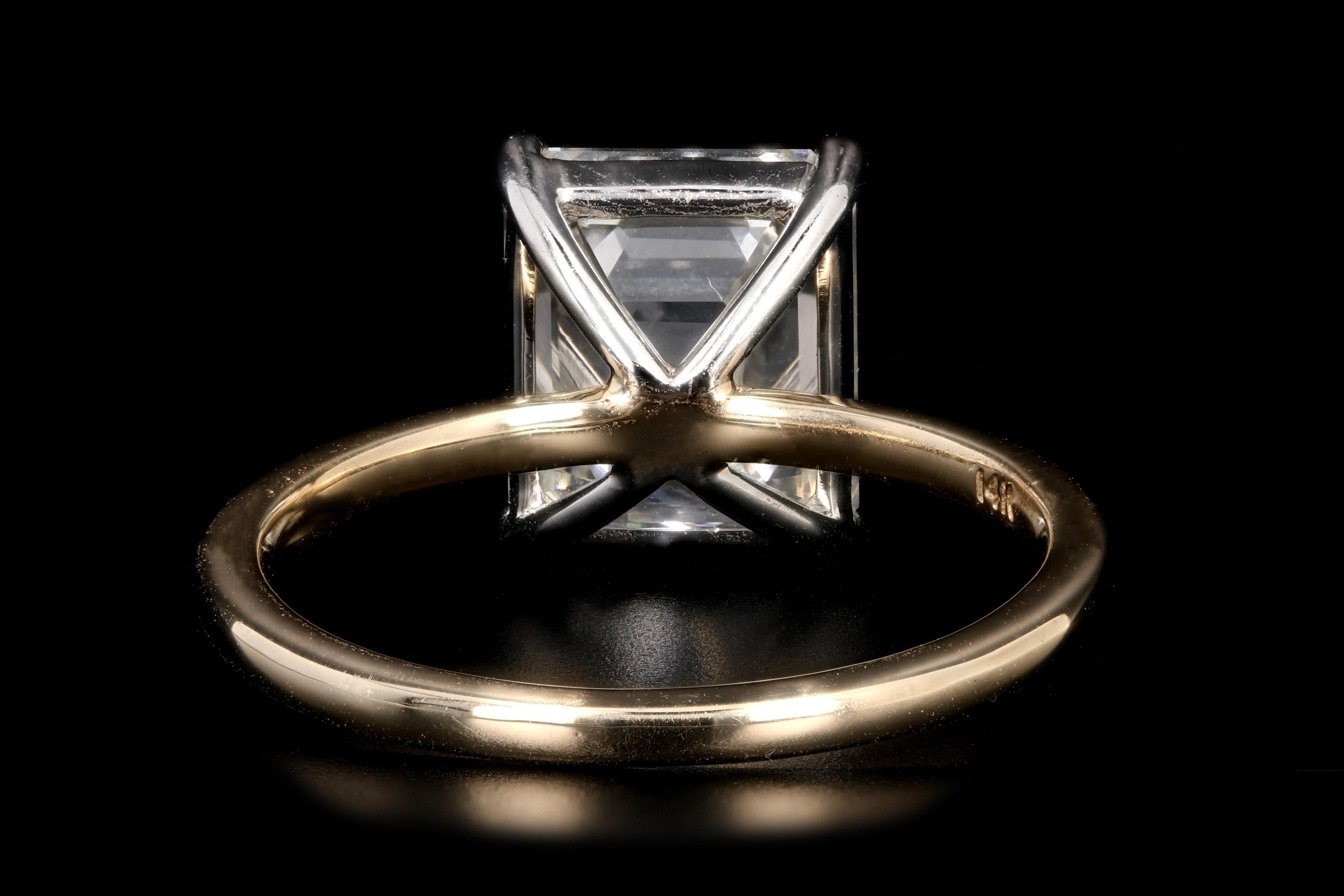 Platinum and 14 Karat Yellow Gold 4.30 Emerald Cut Diamond Engagement Ring 1