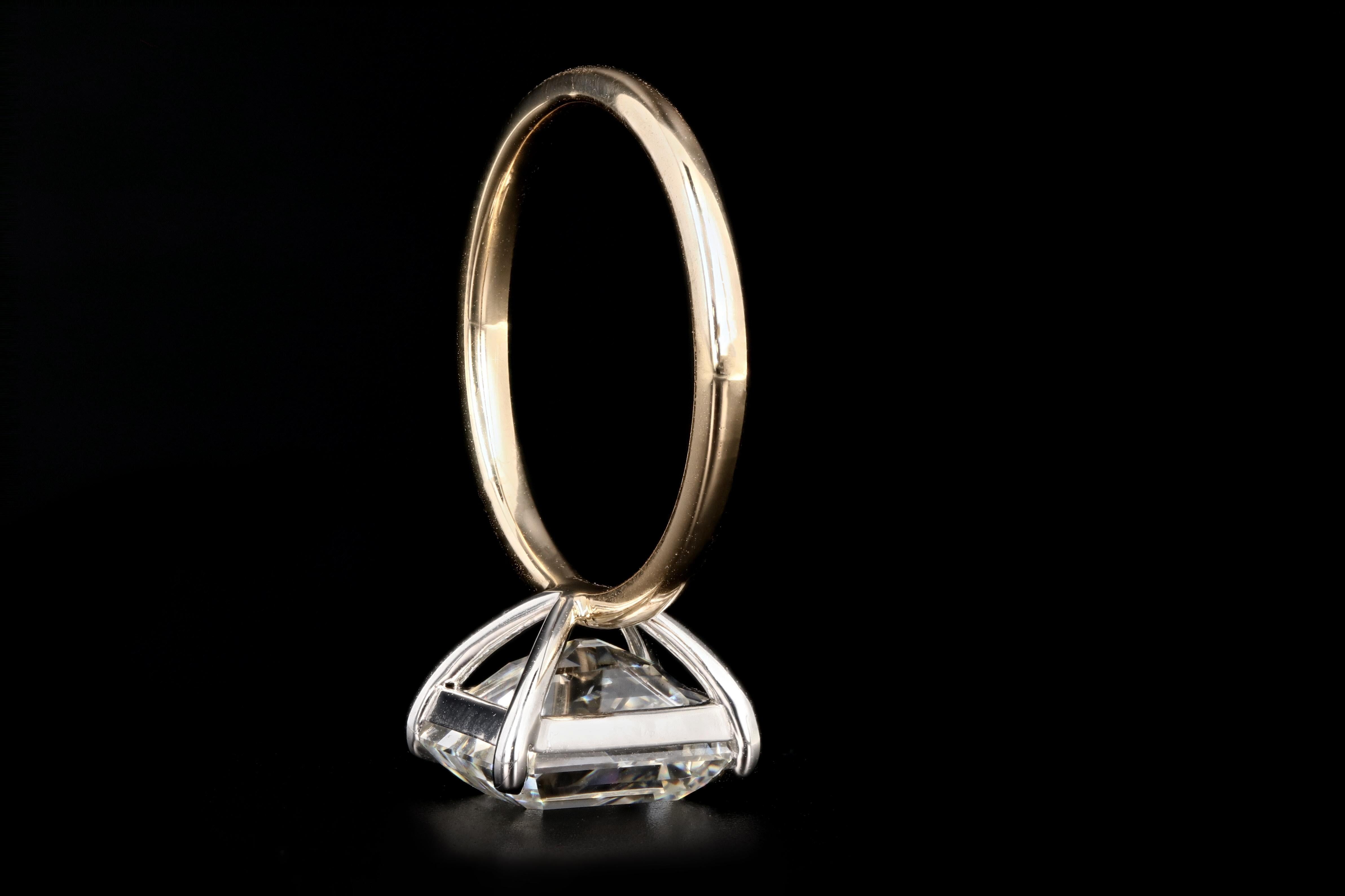 Platinum and 14 Karat Yellow Gold 4.30 Emerald Cut Diamond Engagement Ring 3