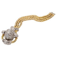 Bracciale in platino e oro giallo 14K con diamanti