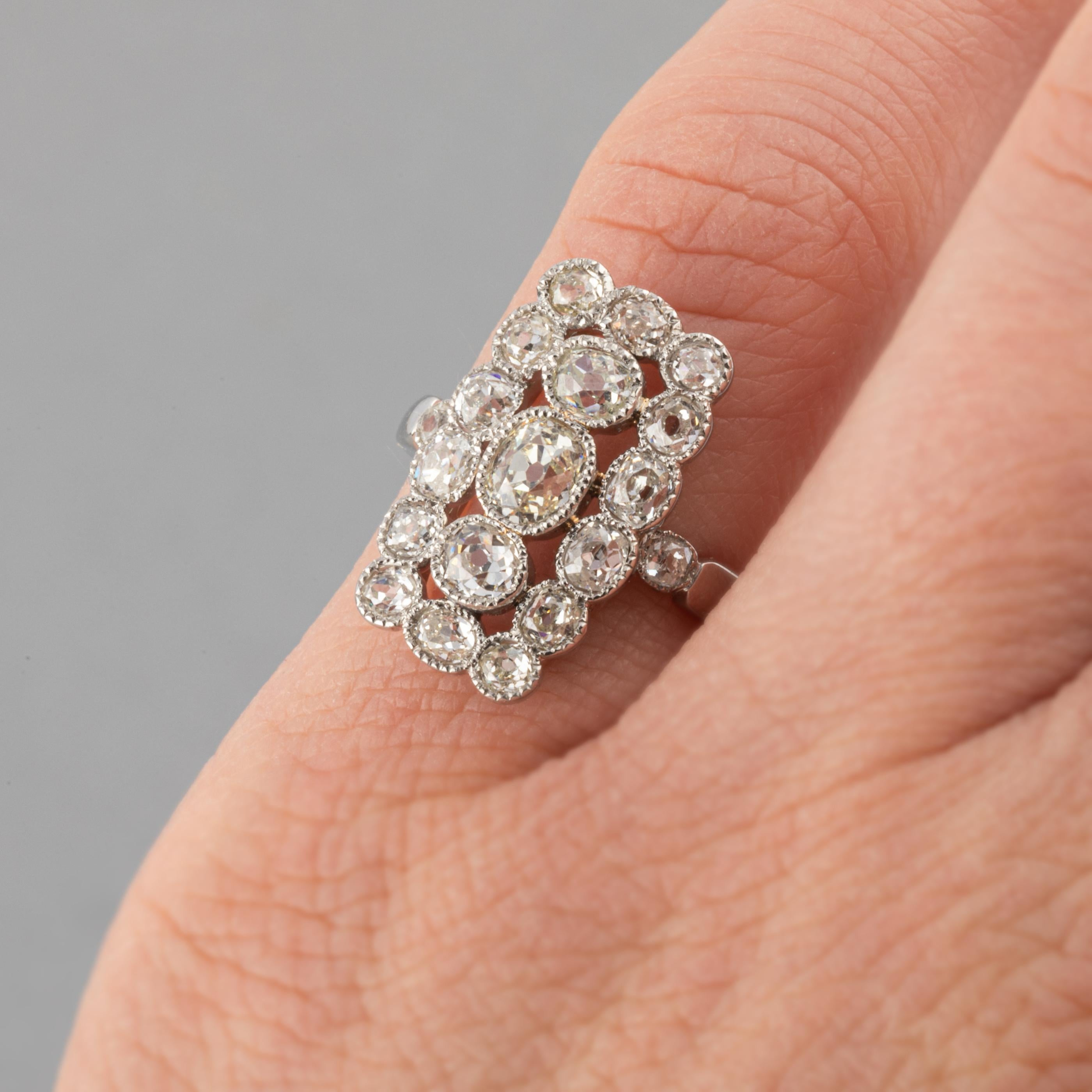 Very lovely ring, made in France circa 1920.
Made in platinum and set with old European cut diamonds. Hallmark for platinum: The old man.
The diamonds weights 1.50 carats total estimate. I/J color, they are clear.
Dimensions: 18mm* 11mm from above.