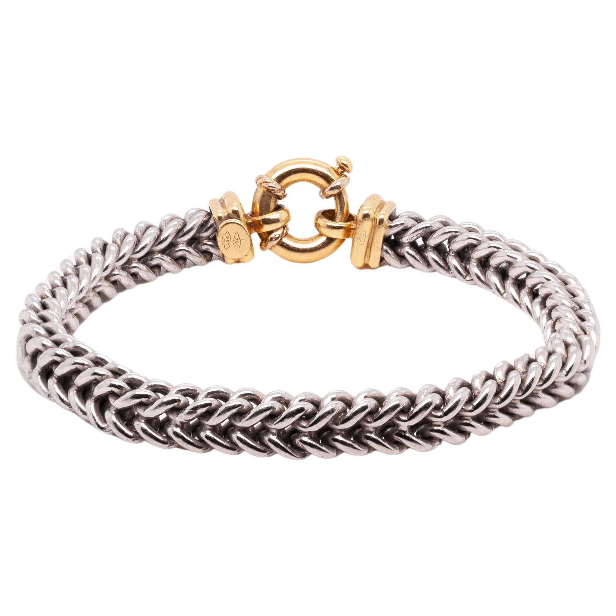 Fabriqué par des experts, ce fantastique bracelet à maillons allie harmonieusement la beauté classique du platine à la riche couleur de l'or jaune 18 carats. Une pièce indispensable pour toutes les amoureuses de bijoux, qui peut être portée seule ou