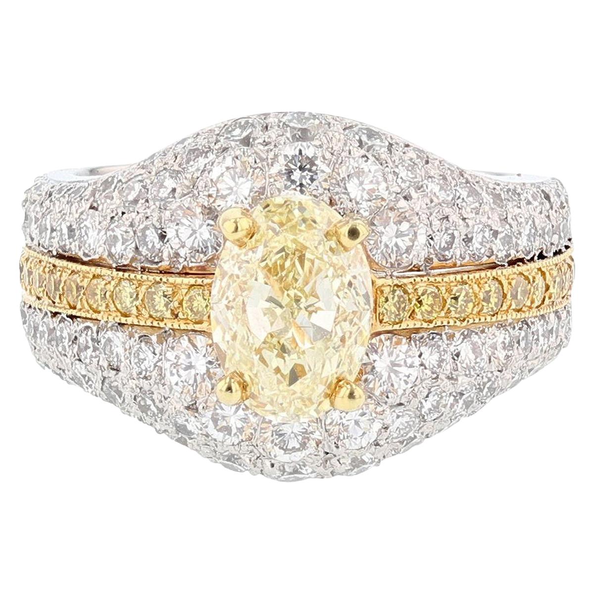 Platinum and 18 Karat Gold 1.51 Carat Certified Fancy Light Yellow Diamond Ring