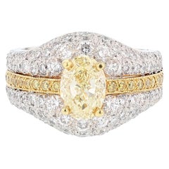 Anillo de platino y oro de 18 quilates con 1,51 quilates de diamante amarillo claro de fantasía certificado