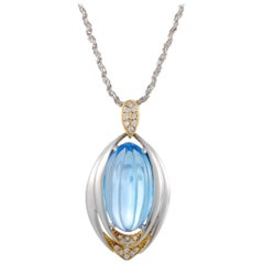 Platinum and 18 Karat Gold Diamonds and Ribbed Topaz Cabochon Oval Pendant