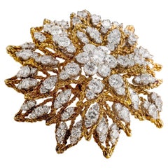 Platinum and 18 Karat Gold Sunburst Design Brooch with Diamonds, circa 1960