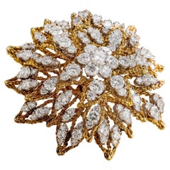 Platinum and 18 Karat Gold Sunburst Design Brooch with Diamonds, circa 1960 