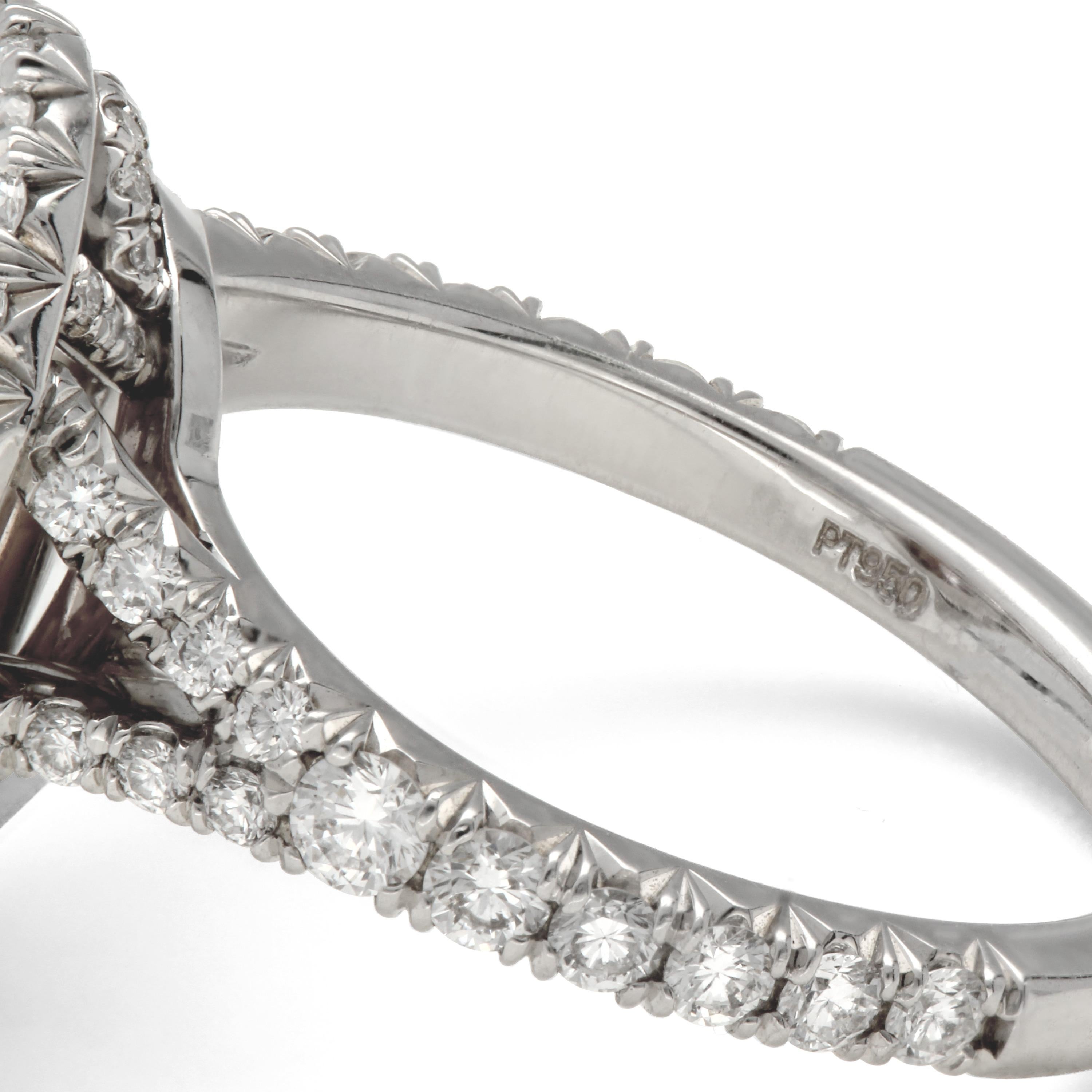 Contemporary Platinum and 18 Karat Rose Gold Double Halo Diamond and Fancy Pink Diamond Ring For Sale