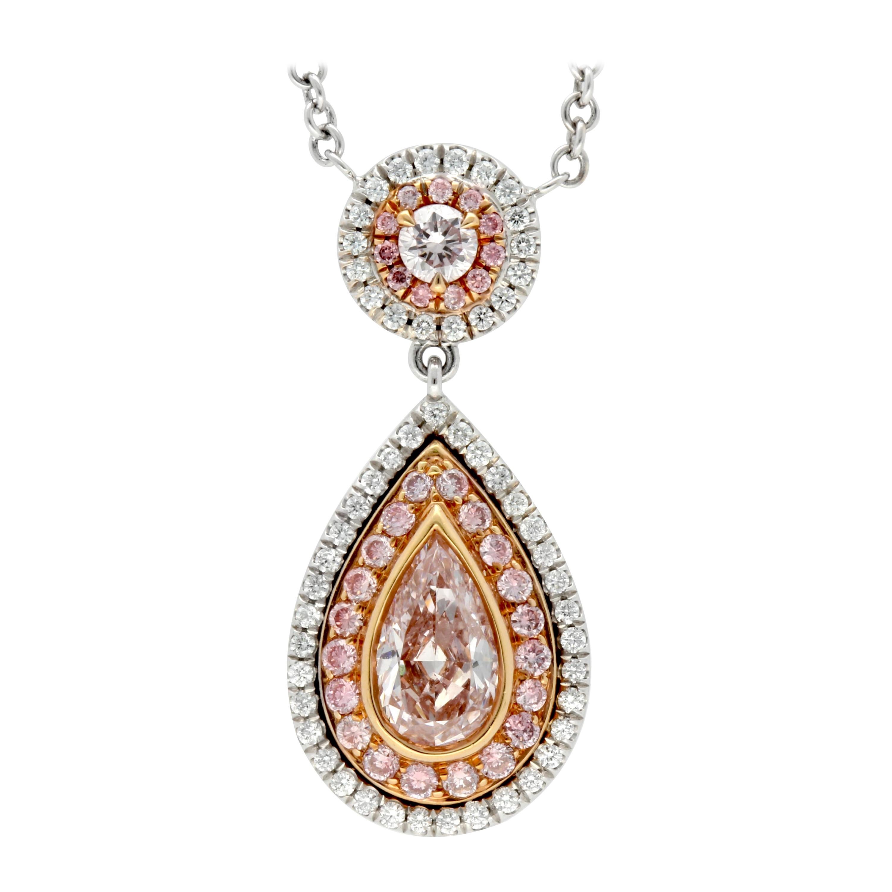 Platinum and 18 Karat Rose Gold Pear Shaped Fancy Pink Diamond Halo Pendant For Sale