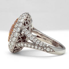 Platinum and 18 Karat Rose Gold Purplish Pink Diamond and Pave Diamond Dome Ring