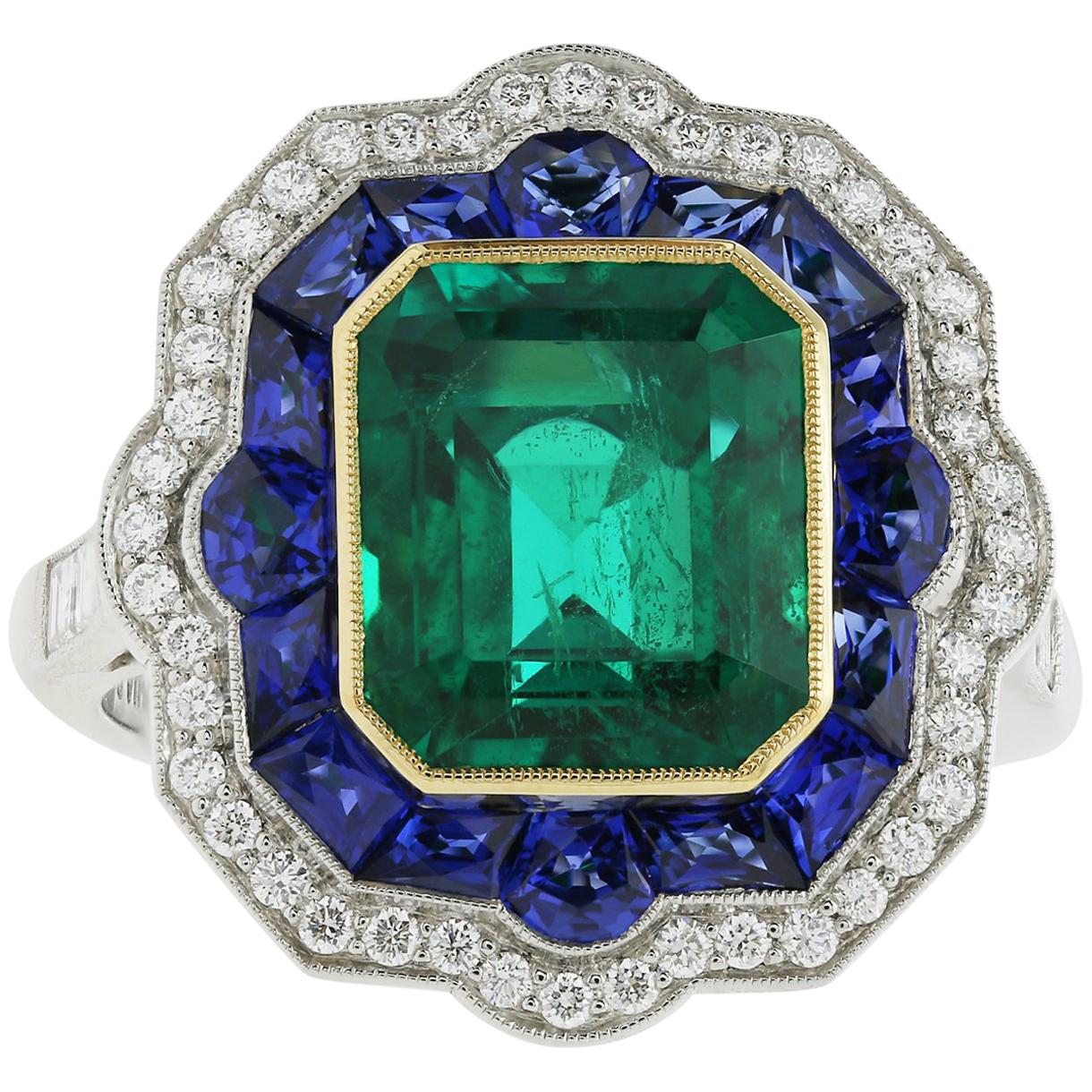 Platinum and 18 Karat Yellow Gold 3.68 Carat Emerald and Sapphire Ring For Sale