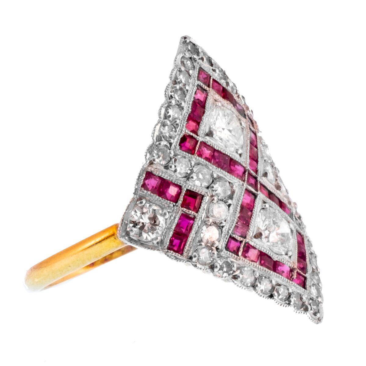 Edwardian Platinum and 18 Karat Yellow Gold Diamond and Ruby Diamond/Kite Shaped Ring 
c.1910

size 6.5

H 2.29 cm x W 2.0 cm / H 0.9 in. x W 0.78 in.
4.25 grams
feels amazing on - very low profile and hugs the finger
a very special ring.