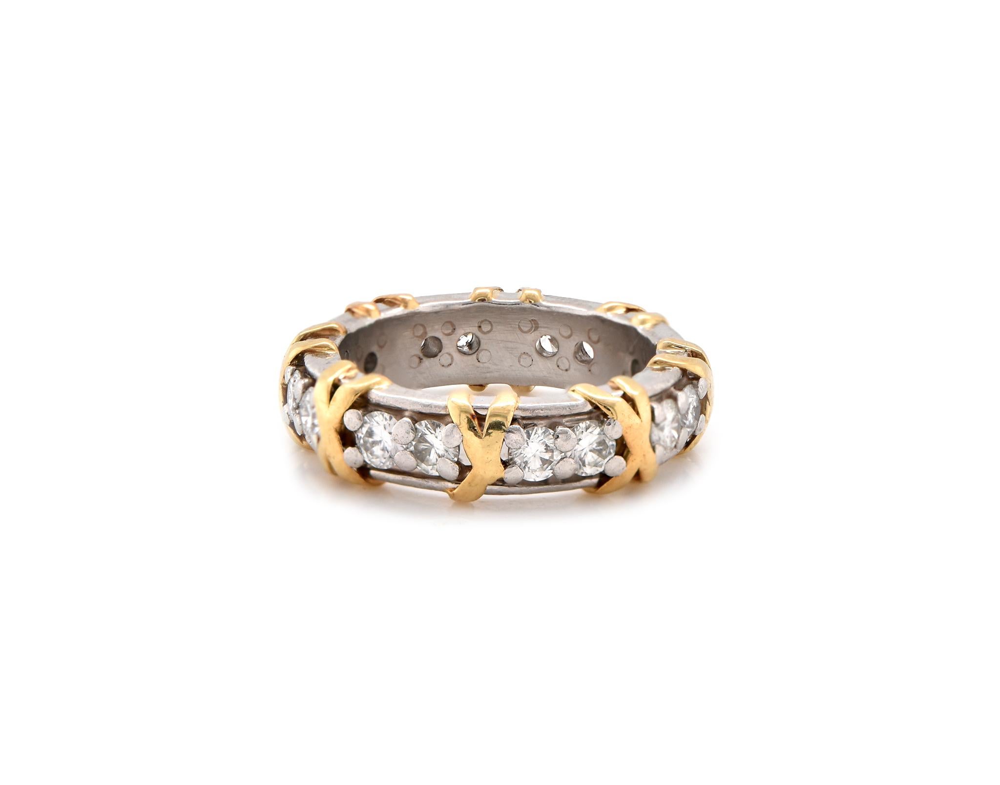 Designer: Custom
Material: Platinum / 18K yellow gold
Diamonds: 16 round brilliant cut = 1.28cttw
Color: H
Clarity: SI1
Size: 5.25
Dimensions: ring measures 5.84mm in width
Weight: 10.81grams
