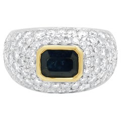 Platinum and 18 Karat Yellow Gold Emerald Cut Sapphire and Pave Diamond Ring