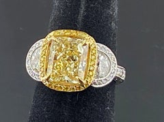 Platinum and 18 KT Yellow Gold 3.74 Ct Radiant Cut Fancy Yellow Diamond Ring
