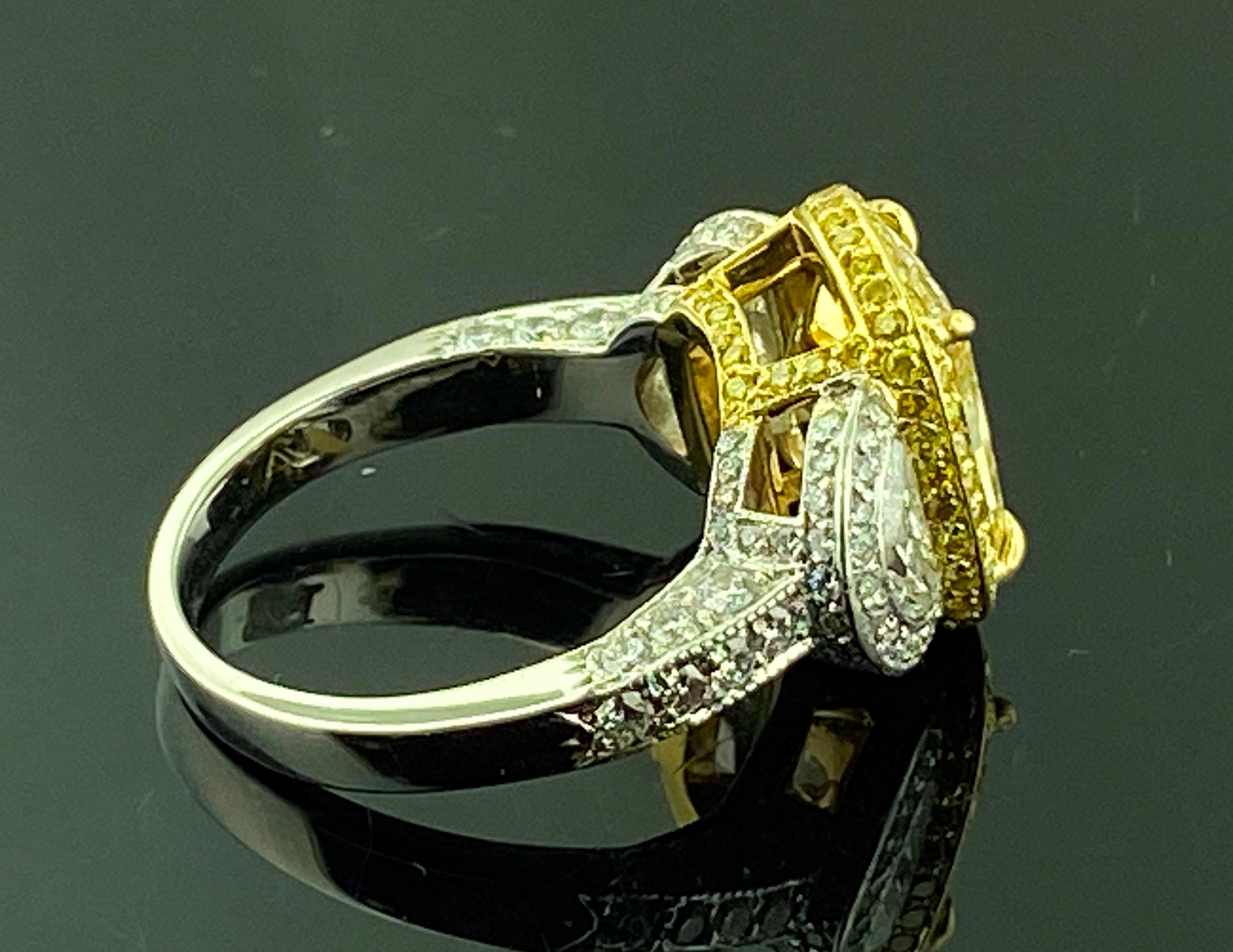 Platinum and 18 KT Yellow Gold 3.74 Ct Radiant Cut Fancy Yellow Diamond Ring For Sale 1