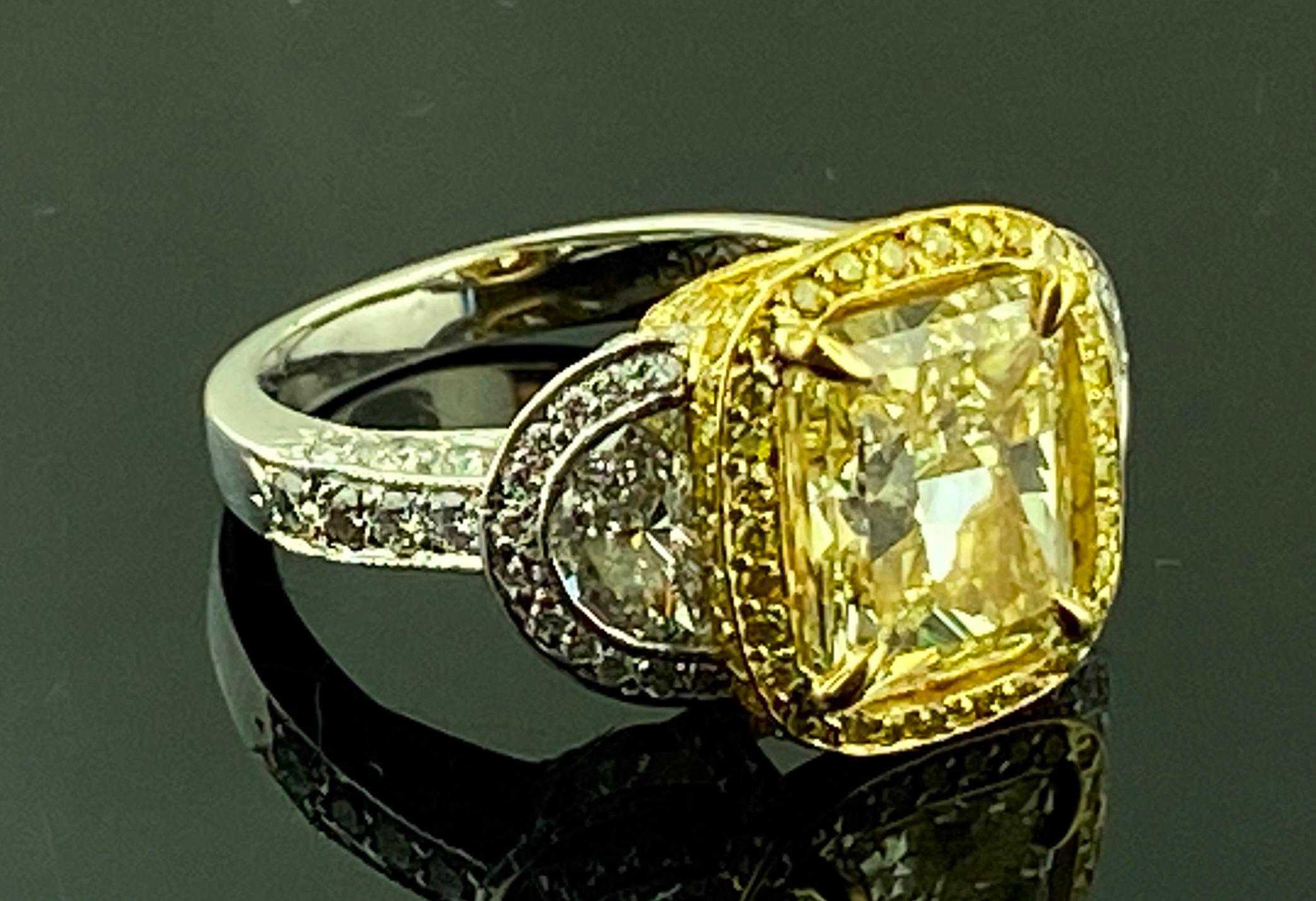 Platinum and 18 KT Yellow Gold 3.74 Ct Radiant Cut Fancy Yellow Diamond Ring For Sale 2
