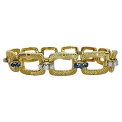 Platin und 18k 1960er Cartier Armband aus Platin mit Diamanten und Saphiren