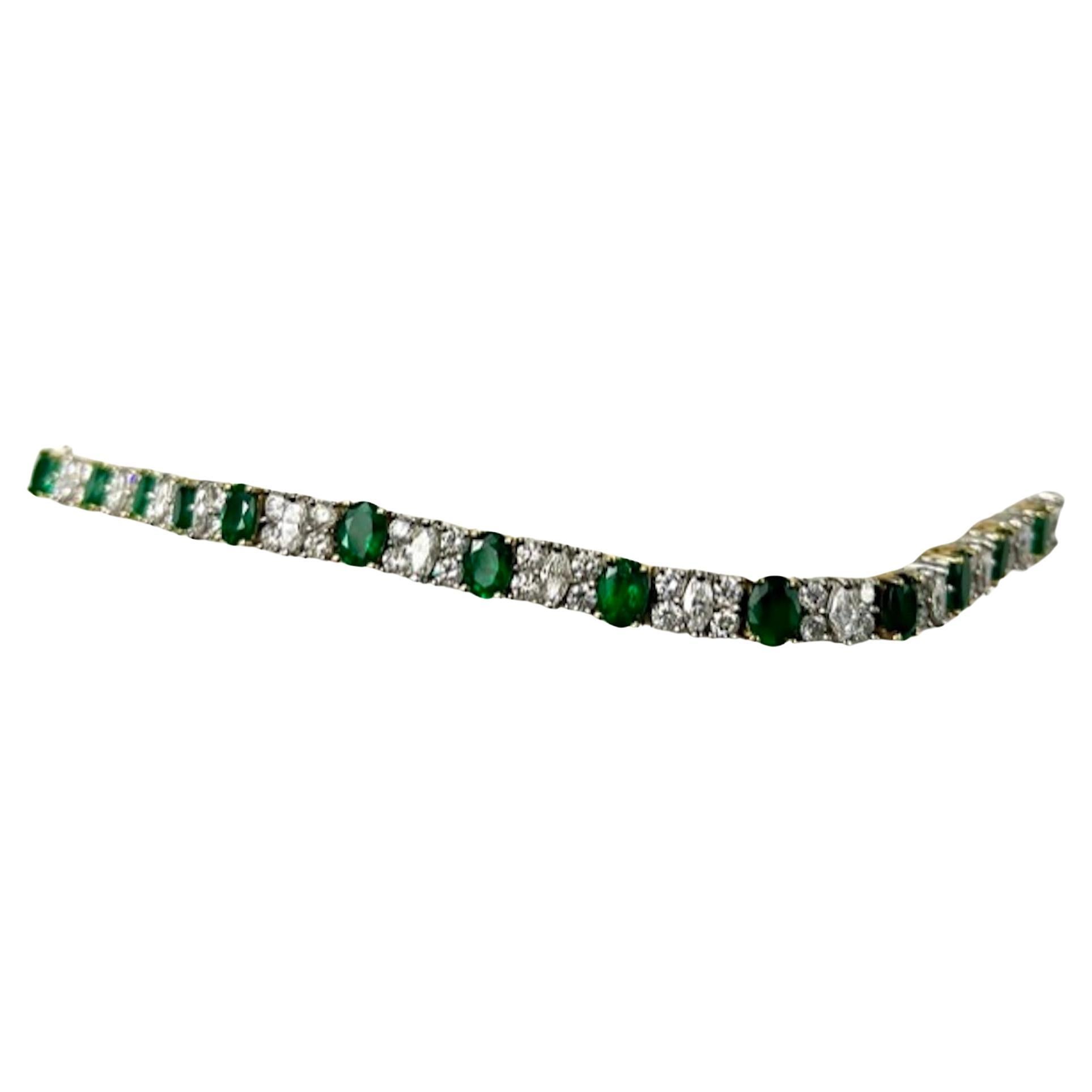 Platinum and 18K Gold Oval Emeralds and Diamonds Bracelet For Sale