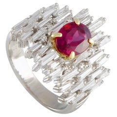 Platinum and 18K Gold Round and Tapered Baguette Diamonds and Ruby Oval Ring