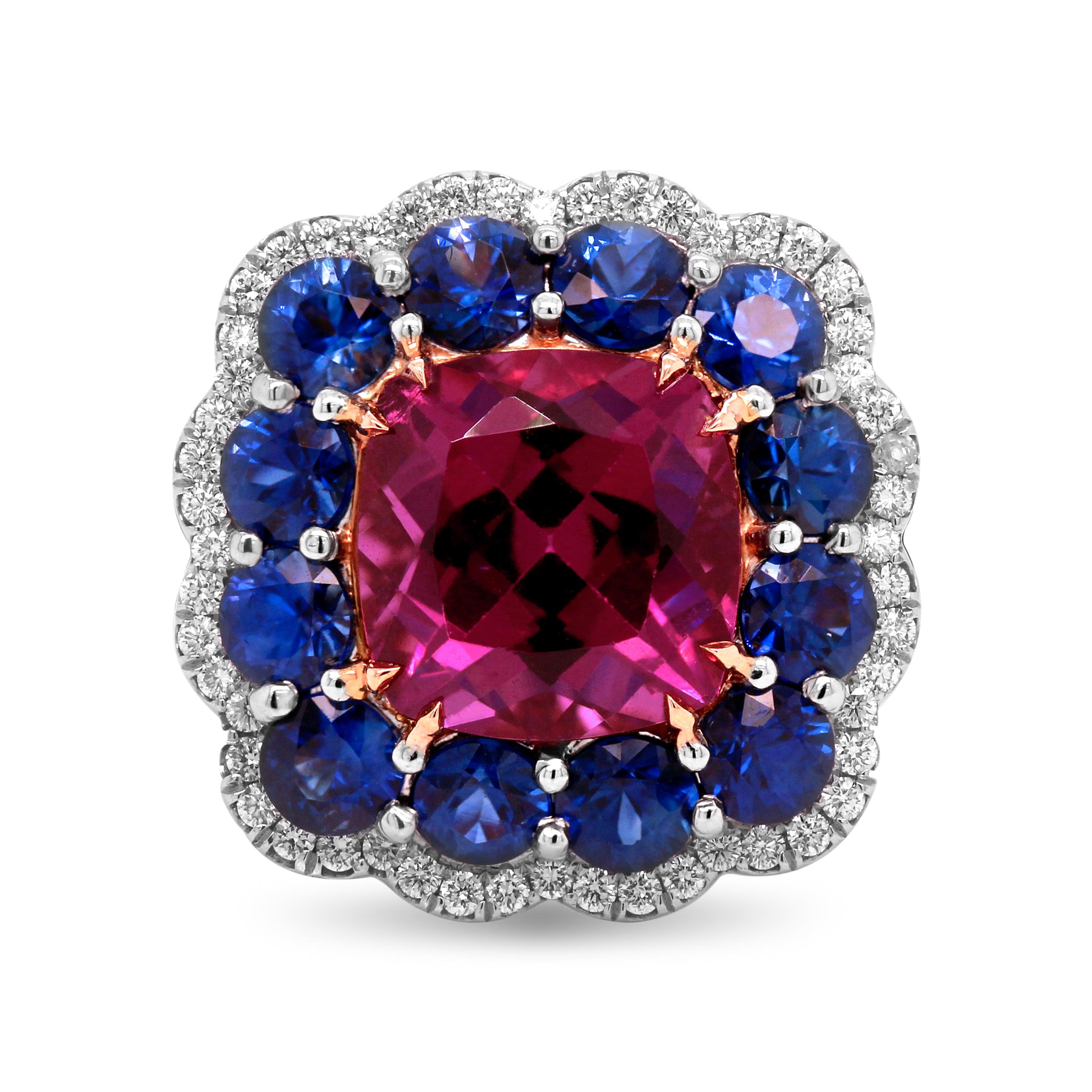 Platinum and 18K Rose Gold Pink Tourmaline Blue Sapphire Diamond Cocktail Ring

This one-of-a-kind ring features a cushion-cut pink tourmaline with blue sapphires and diamonds surrounding.

5.42 carat Pink Tourmaline center

2.99 carat Blue