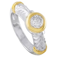 Bague en platine et or jaune 18 carats sertie d'un diamant de 0,60 ct MF02-070826