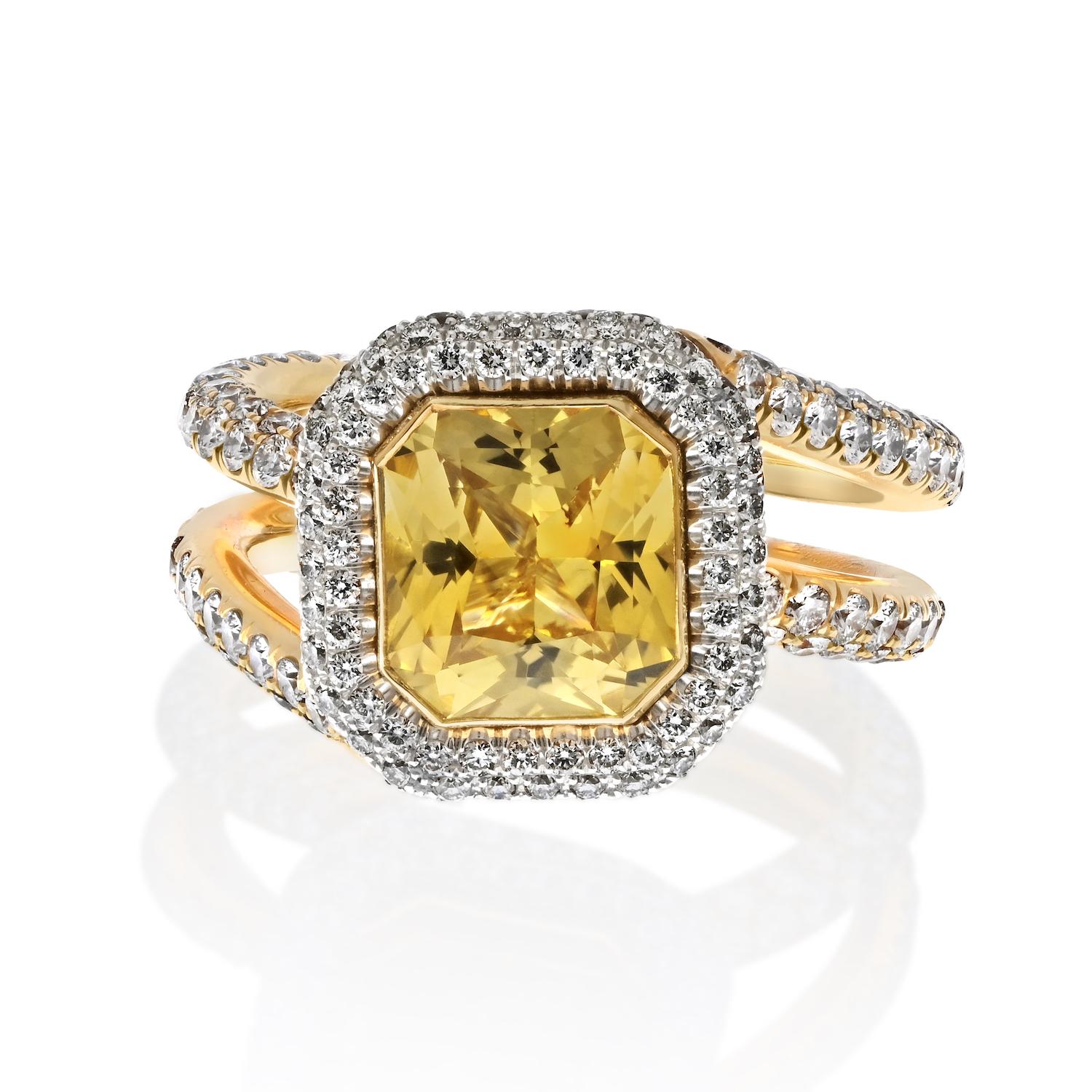 Introducing our stunning handmade diamond and yellow sapphire cocktail ring, a true masterpiece of craftsmanship and design. This exquisite piece is crafted in 18k yellow gold and platinum, featuring a beautiful natural yellow sapphire at its